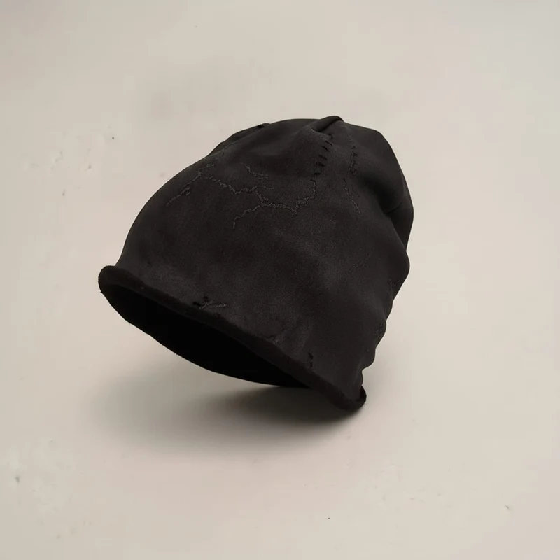 Cuffia melange con strappi a stella - Nero