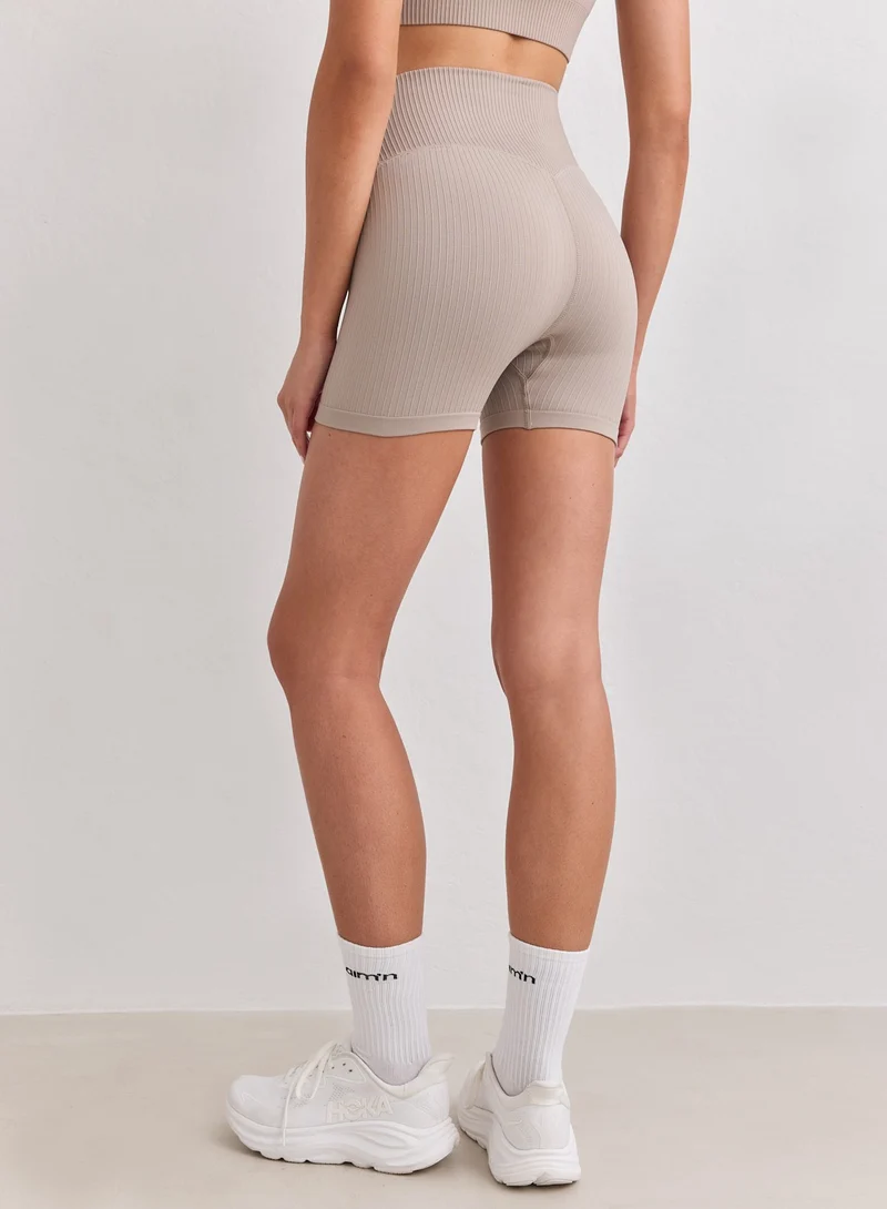 Dark Clay Ribbed Seamless Midi Biker Shorts