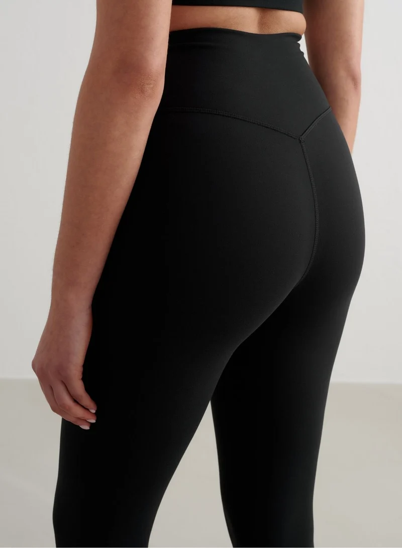 Black Sense Stirrup Tights