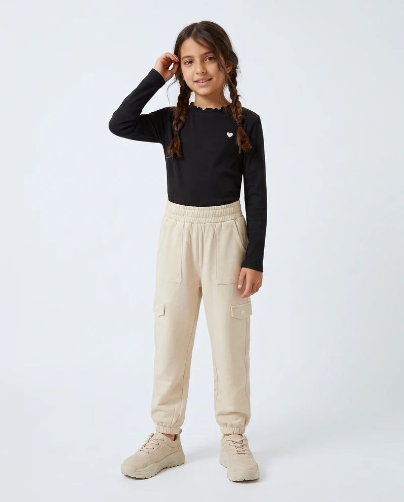 Jogger bambina comodi con tasconi e vita elastica - Beige