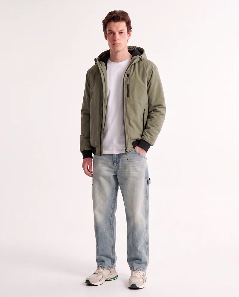 Giubbotto imbottito con cappuccio e tasche - Verde kaki