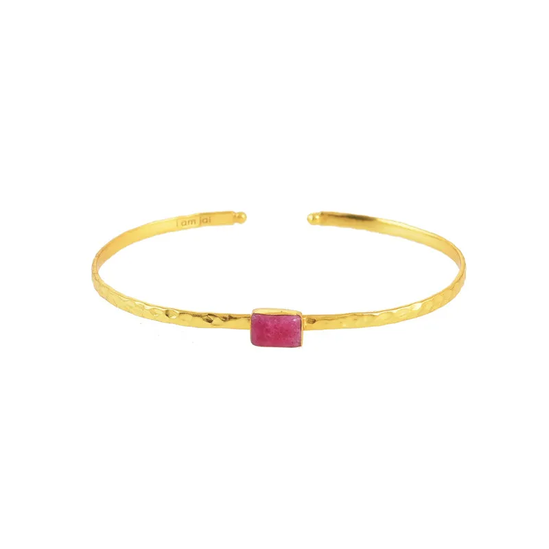 Gouden armband met paarse edelsteen