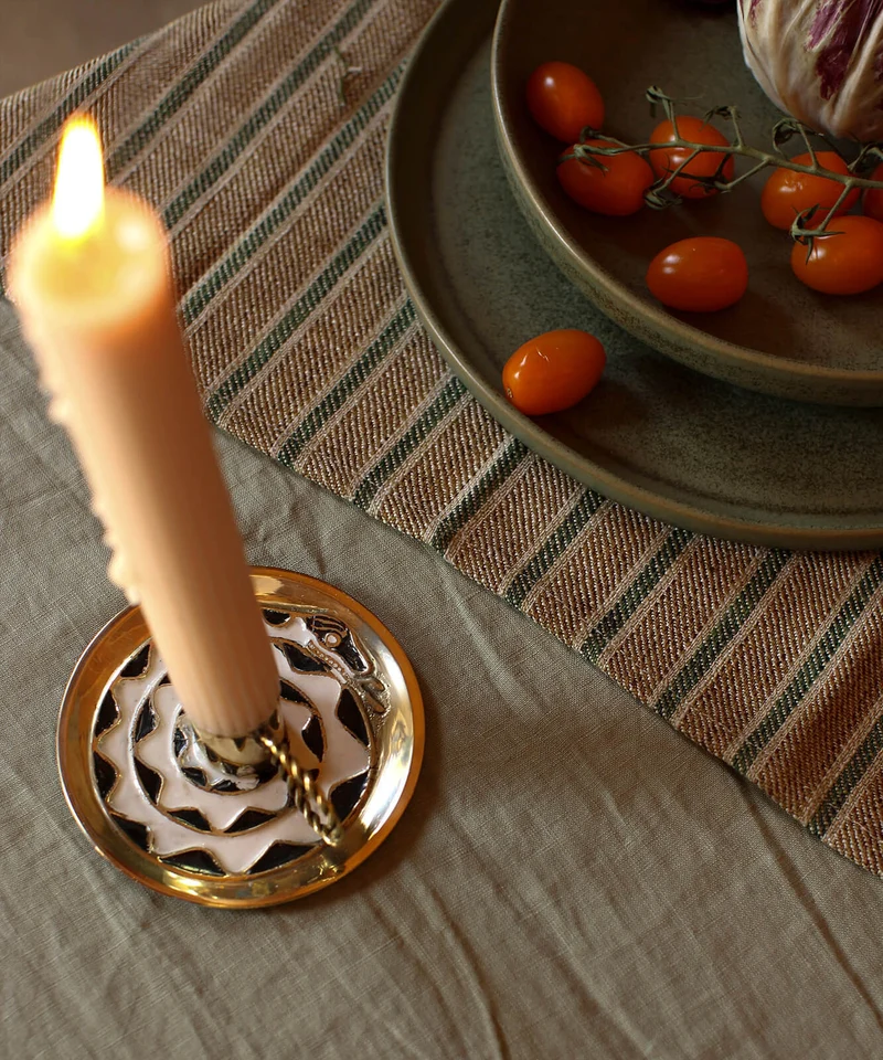 Curly snake candle holder