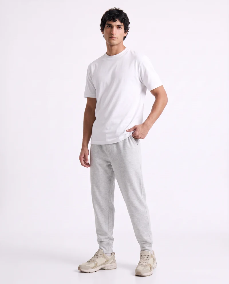 Pantaloni Jogger Interlock con Tasche - Grigio chiaro mel.