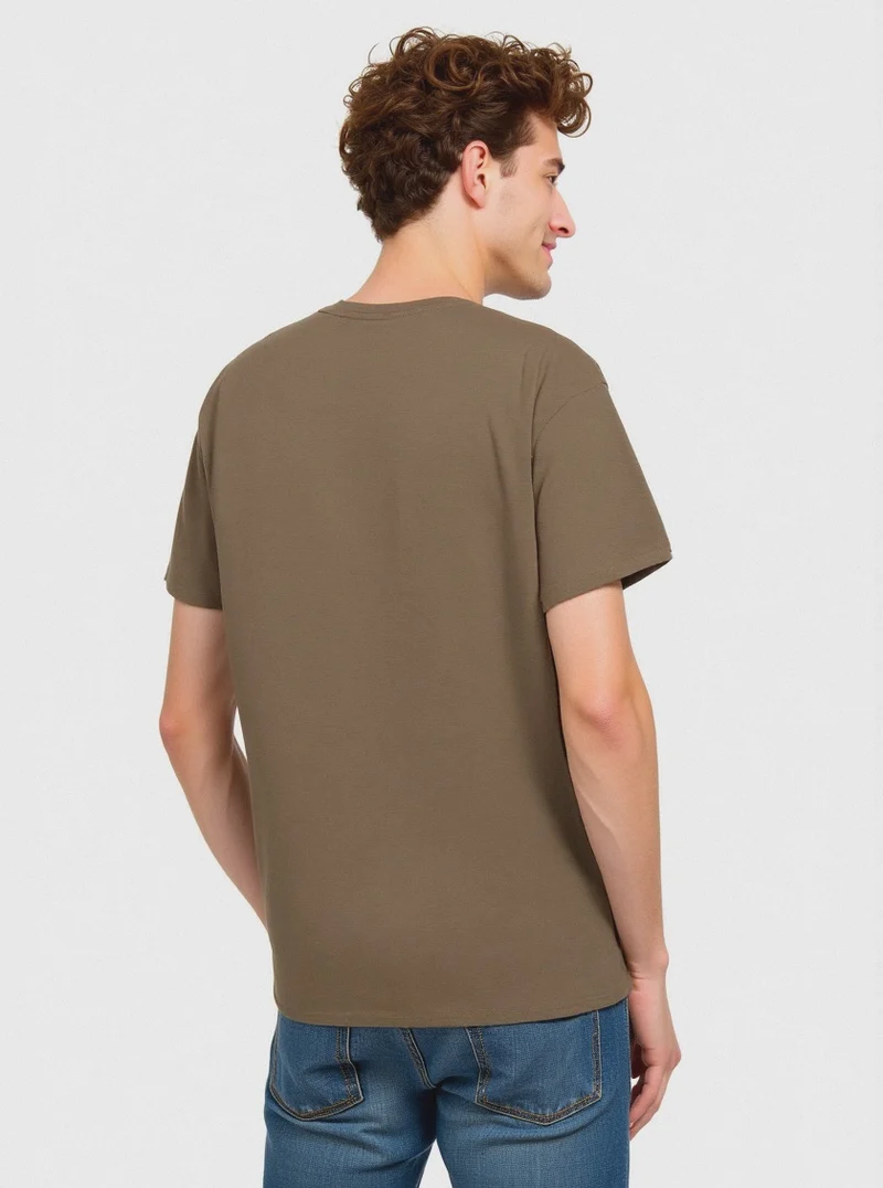 T-SHIRT IN COTONE CON STAMPA FLOCK - Verde kaki
