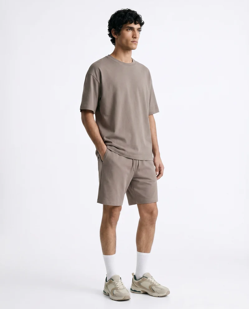 T-shirt uomo jersey relaxed fit maniche corte - Grigio fango