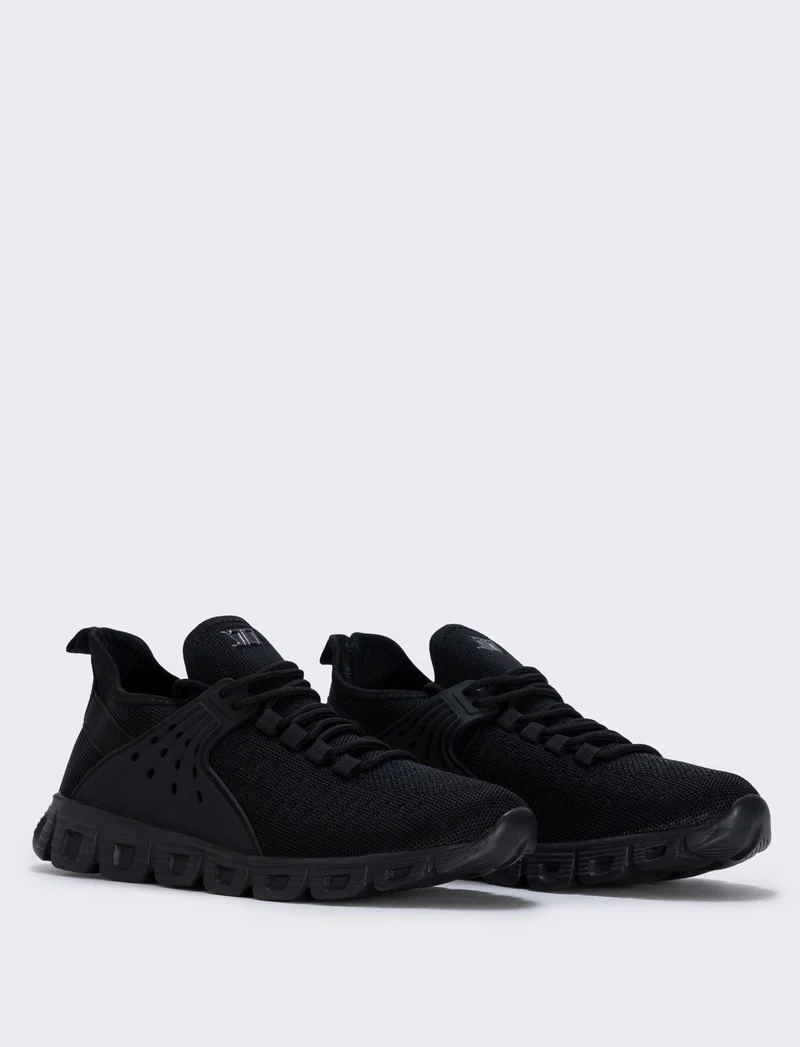 Sneakers running uomo in tessuto tecnico - Nero