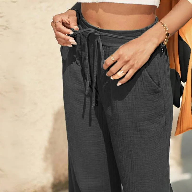 Olivenorma Einfarbige, elastische Damen-Baggy-Hose aus Leinen mit mittlerer Taille und Taschen