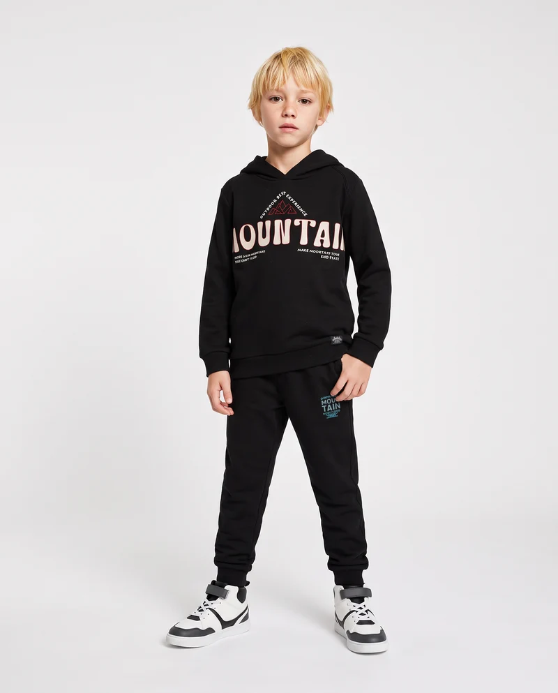 Jogger in felpa con stampa e tasche - Nero