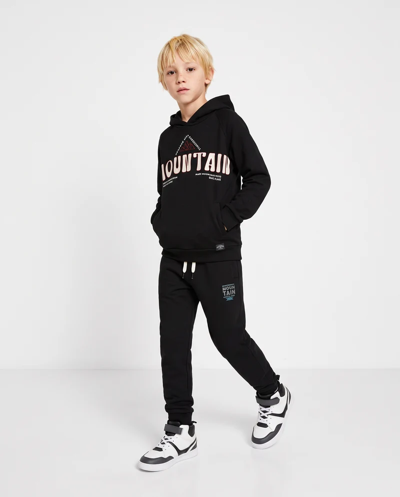 Jogger in felpa con stampa e tasche - Nero