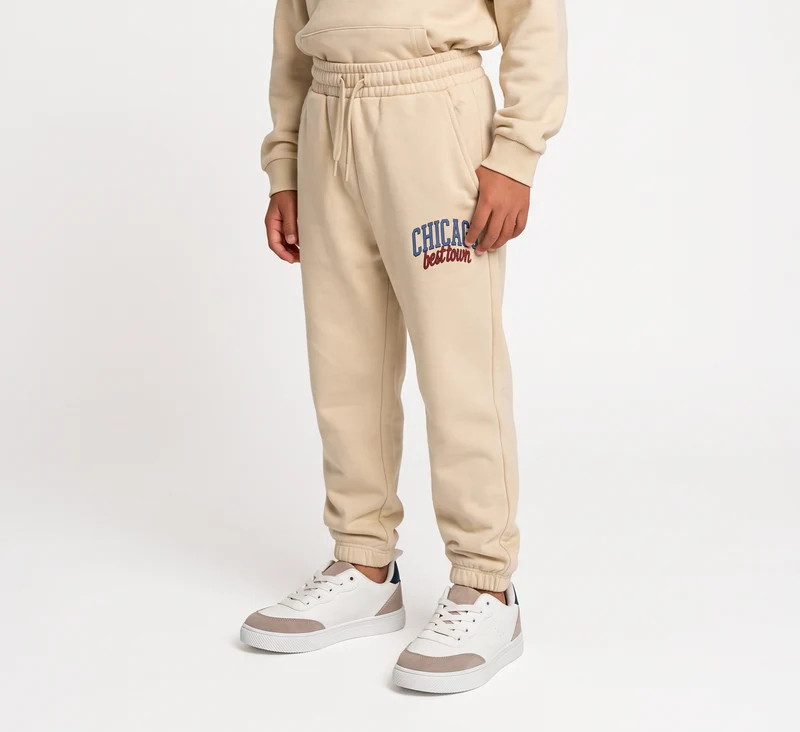 Jogger in felpa con stampa college - Beige