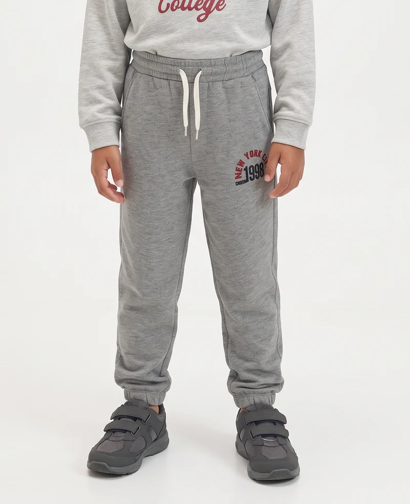 Jogger in felpa con stampa college - Grigio chiaro mel.