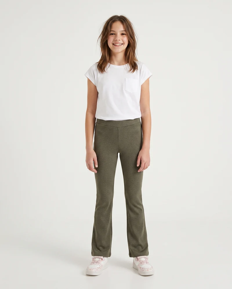 Pantaloni flare in tessuto spigato elastico - Verde