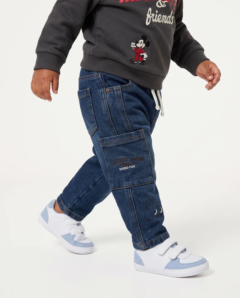 Jeans ampi con ricami e tasconi laterali - Denim