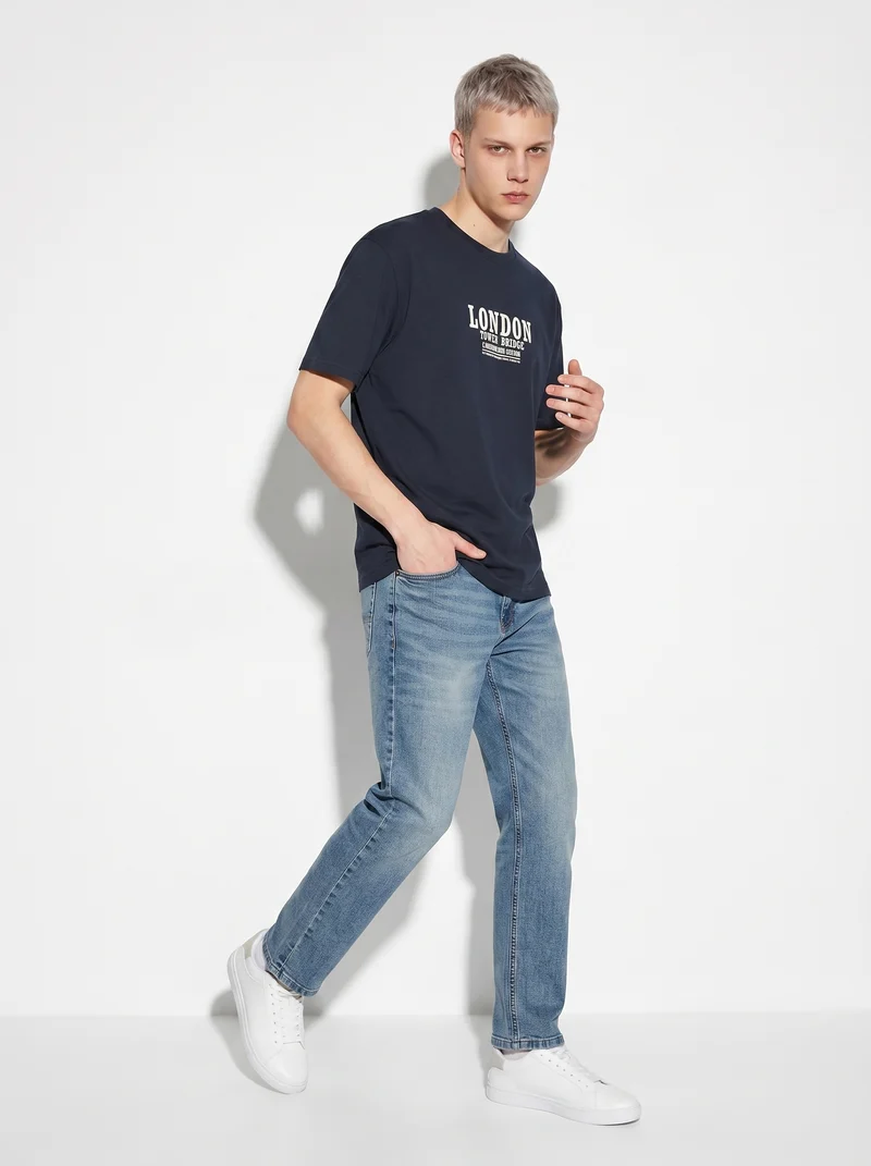 Jeans slim fit blu chiaro effetto slavato - Denim chiaro