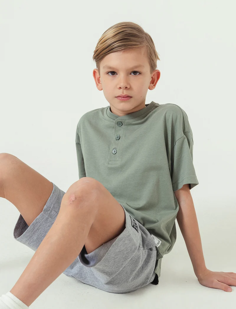 Bermuda fluo da bambino - Grigio mel.