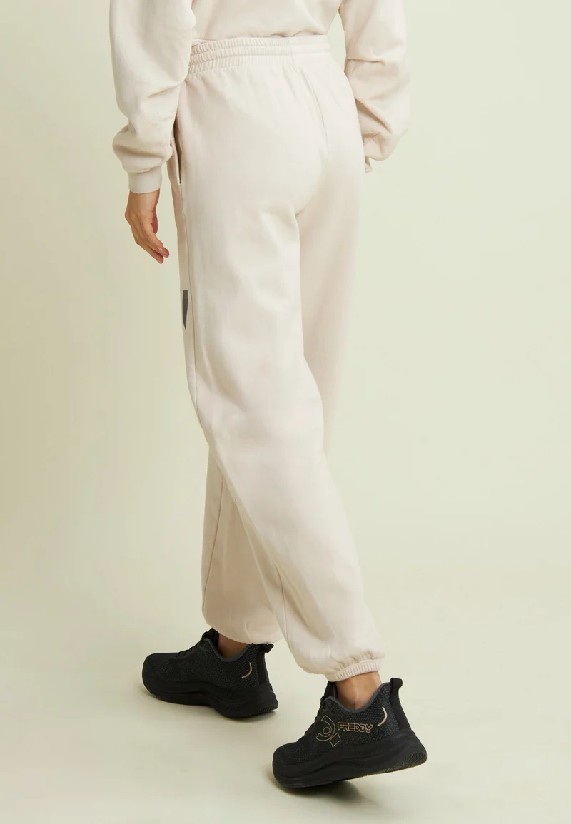 Flow print fleece trousers with gathered bottoms