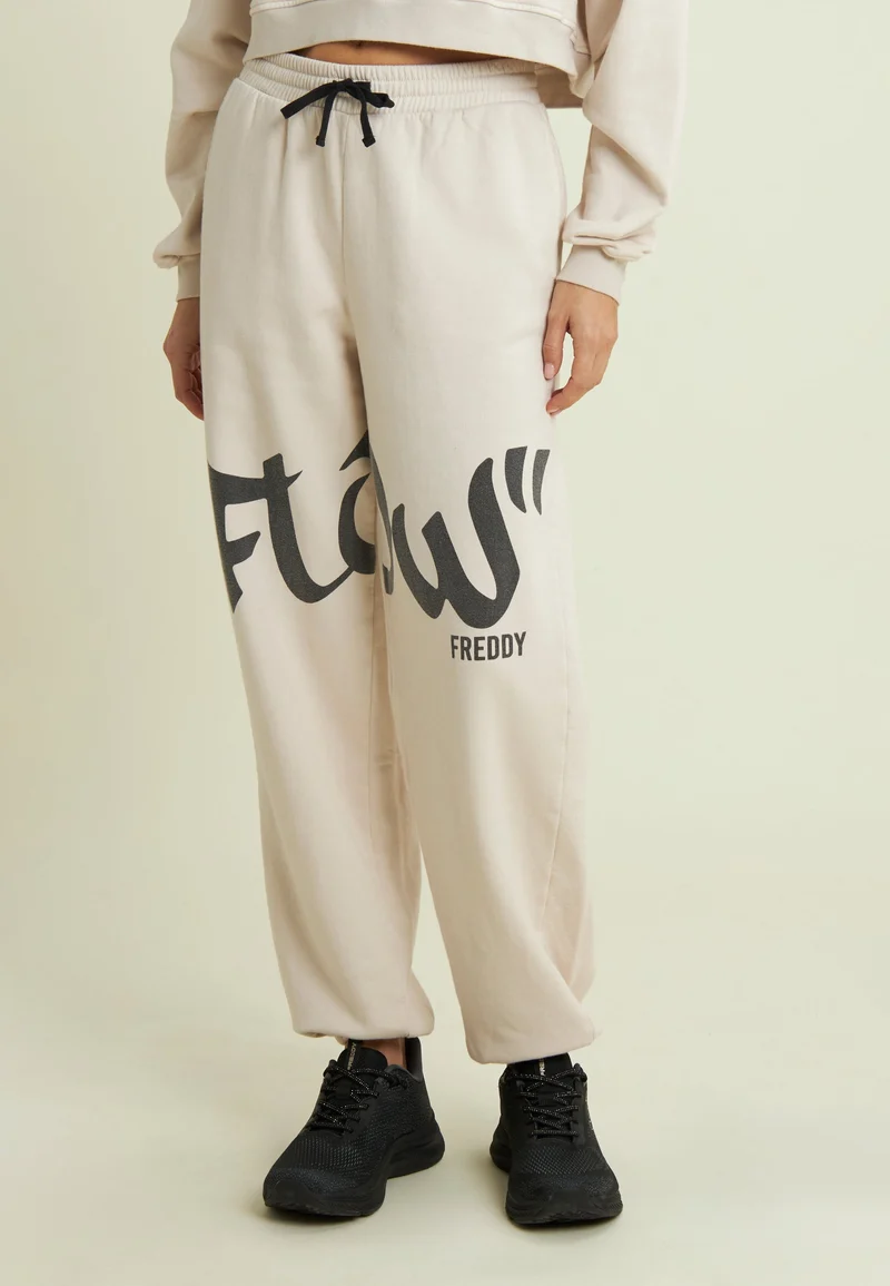 Flow print fleece trousers with gathered bottoms