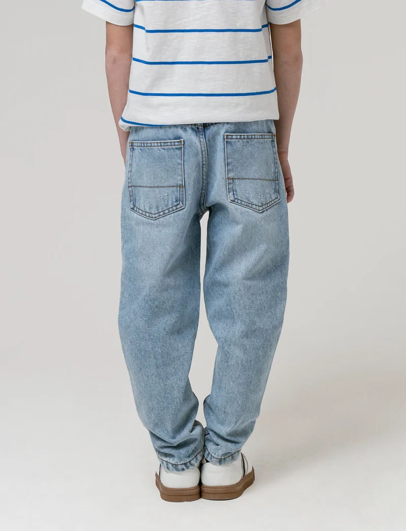 Jeans con rotture da bambino - Denim