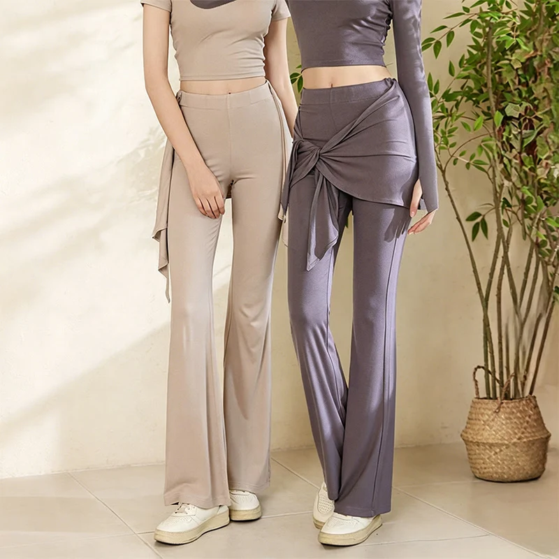 Olivenorma Yogahose für Damen mit asymmetrischem Wickeldesign, hohem Bund und ausgestelltem Bein, geknotetem Bund.