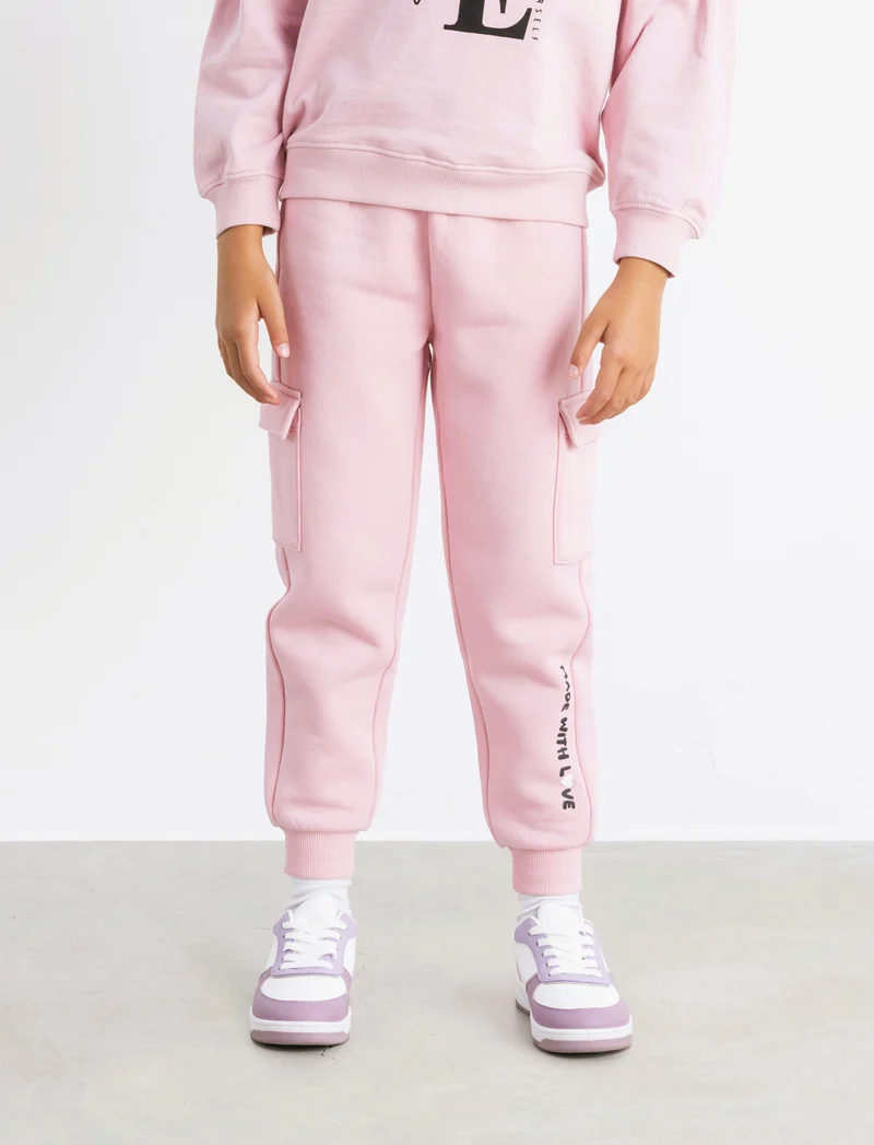 Pantaloni in felpa con tasconi. - Rosa