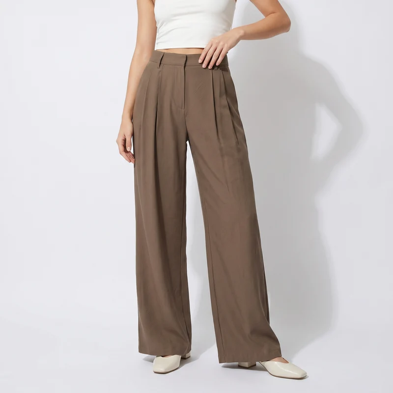 Pantaloni palazzo con pinches e tasche - Grigio fango