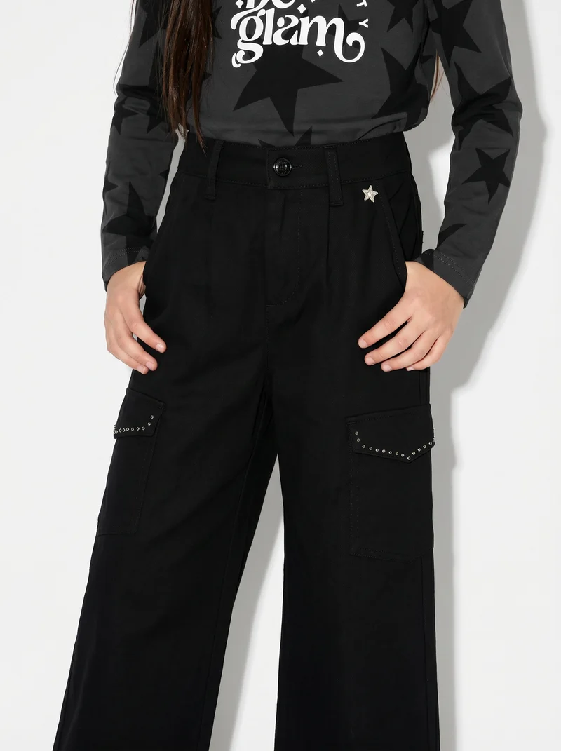 Pantalone da bambina con tasconi e borchie - Nero