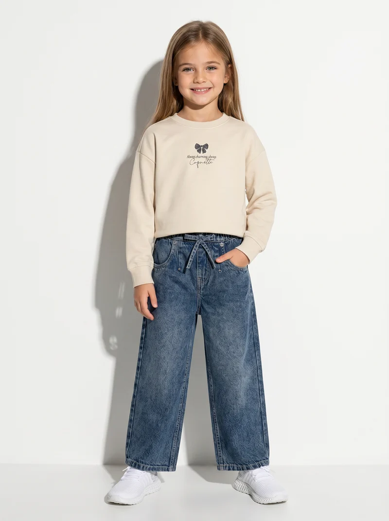 Pantaloni jogger denim wide leg con tasche - Denim
