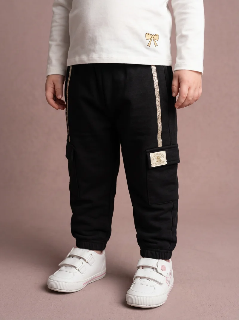 Pantaloni in cotone con tasconi e laccio - Nero
