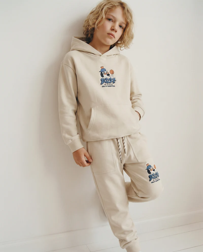 Jogger in cotone con tasche e coulisse - Beige