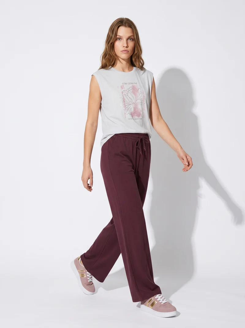 T-shirt manica a T con scollo paricollo - var 2