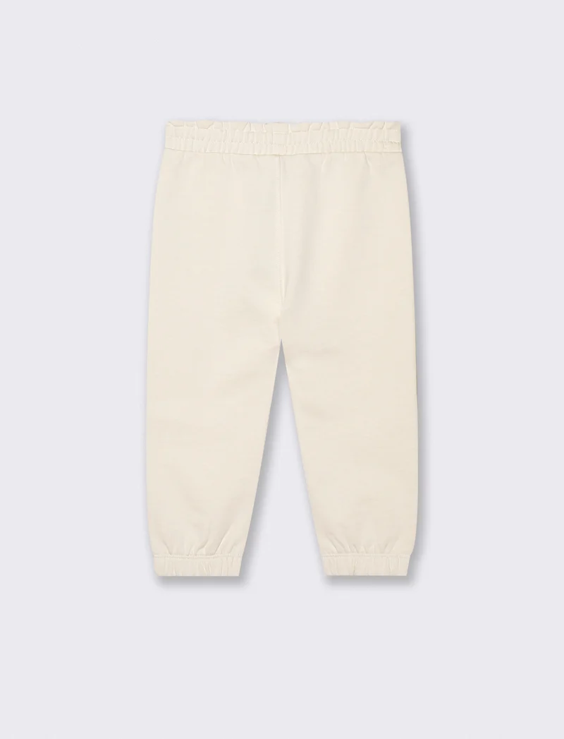 Jogger in cotone con fiocco e patch - Beige
