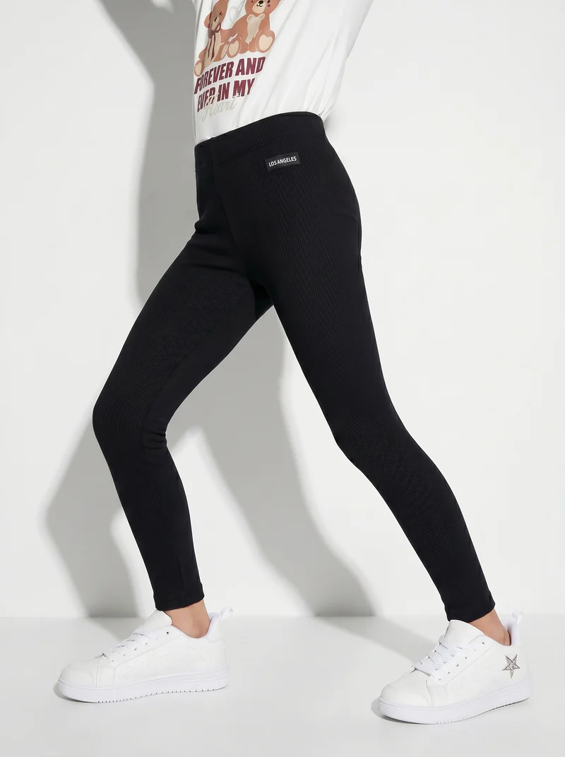 Leggings morbidi in costina elastica - Nero
