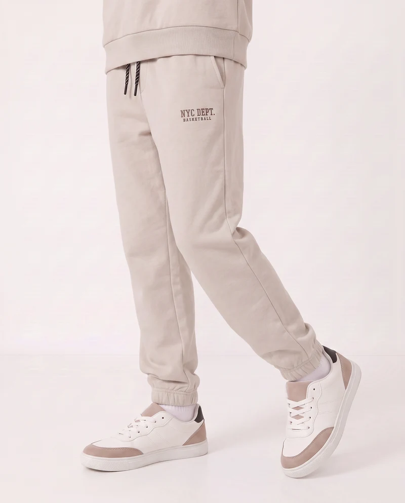 Jogger in felpa con coulisse e patch - Beige