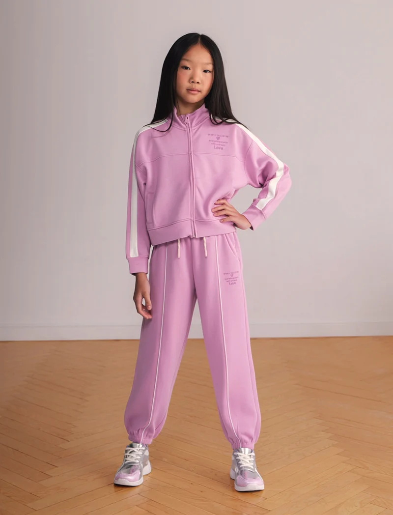 Jogger sportivo con profili a contrasto - Rosa