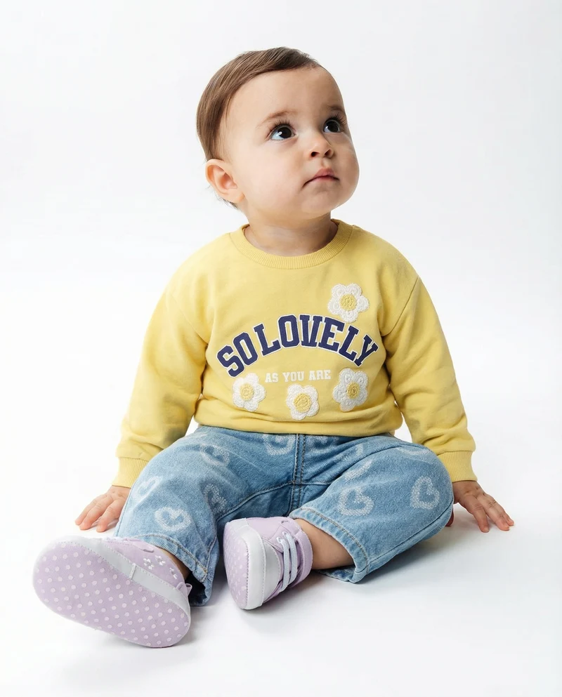Jeans ampi con cuori in fantasia - Denim