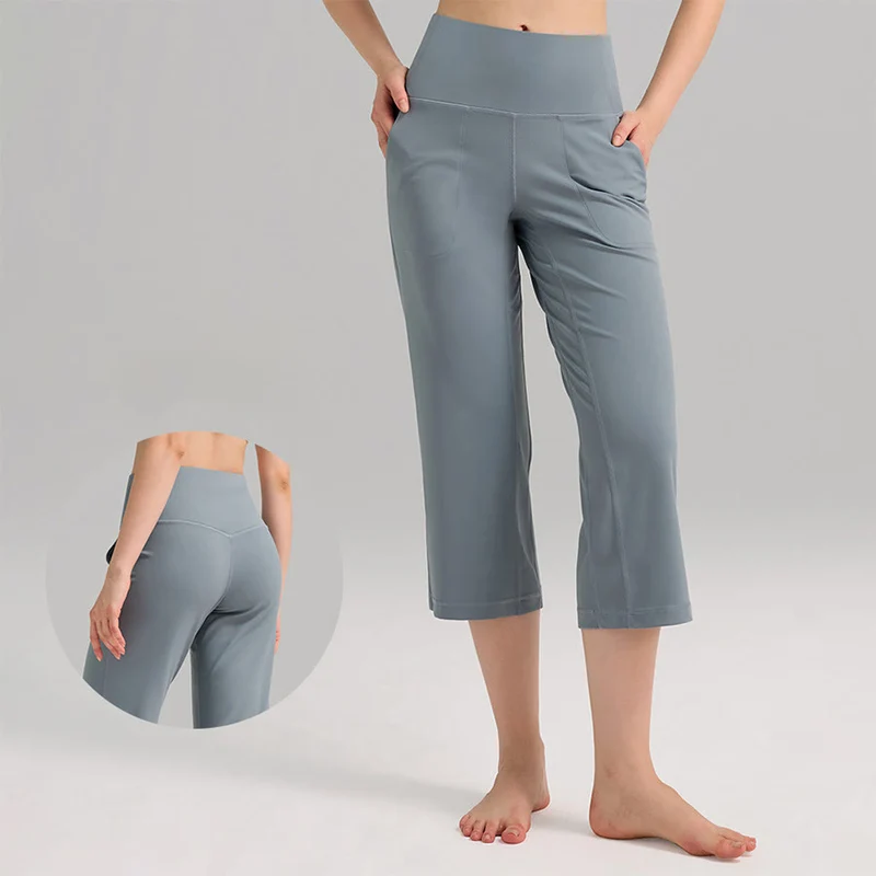 Olivenorma Caprihose mit hohem Bund, weitem Bein und Taschen – ideal für Yoga und Fitness – Damen