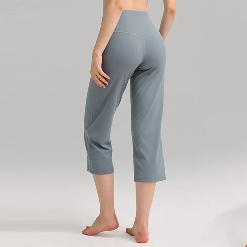 Olivenorma Caprihose mit hohem Bund, weitem Bein und Taschen – ideal für Yoga und Fitness – Damen
