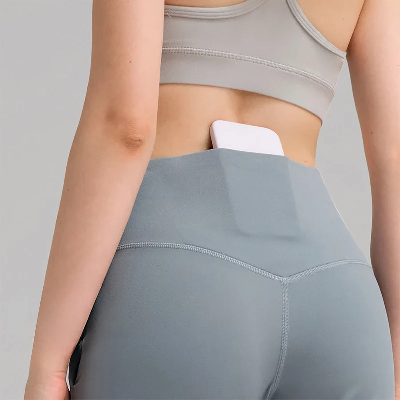 Olivenorma Caprihose mit hohem Bund, weitem Bein und Taschen – ideal für Yoga und Fitness – Damen