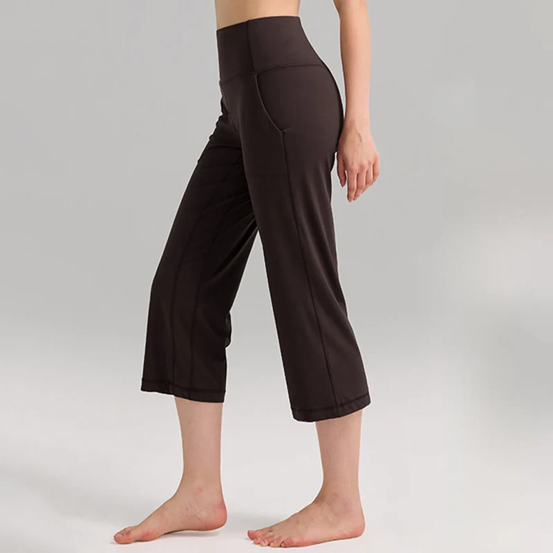 Olivenorma Caprihose mit hohem Bund, weitem Bein und Taschen – ideal für Yoga und Fitness – Damen