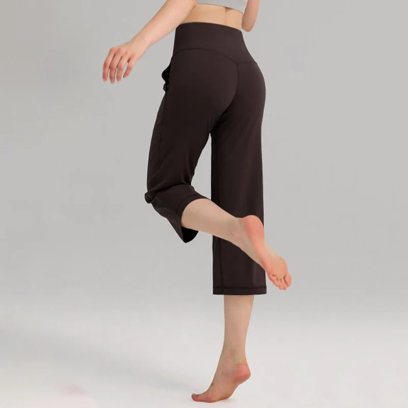 Olivenorma Caprihose mit hohem Bund, weitem Bein und Taschen – ideal für Yoga und Fitness – Damen
