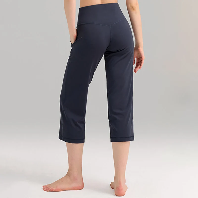Olivenorma Caprihose mit hohem Bund, weitem Bein und Taschen – ideal für Yoga und Fitness – Damen