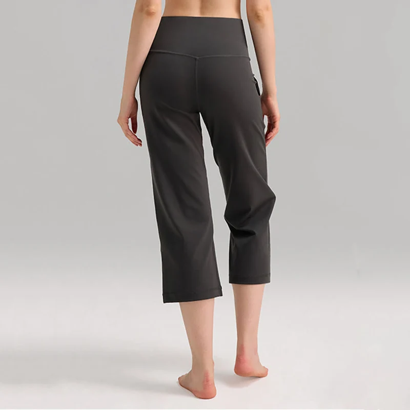Olivenorma Caprihose mit hohem Bund, weitem Bein und Taschen – ideal für Yoga und Fitness – Damen