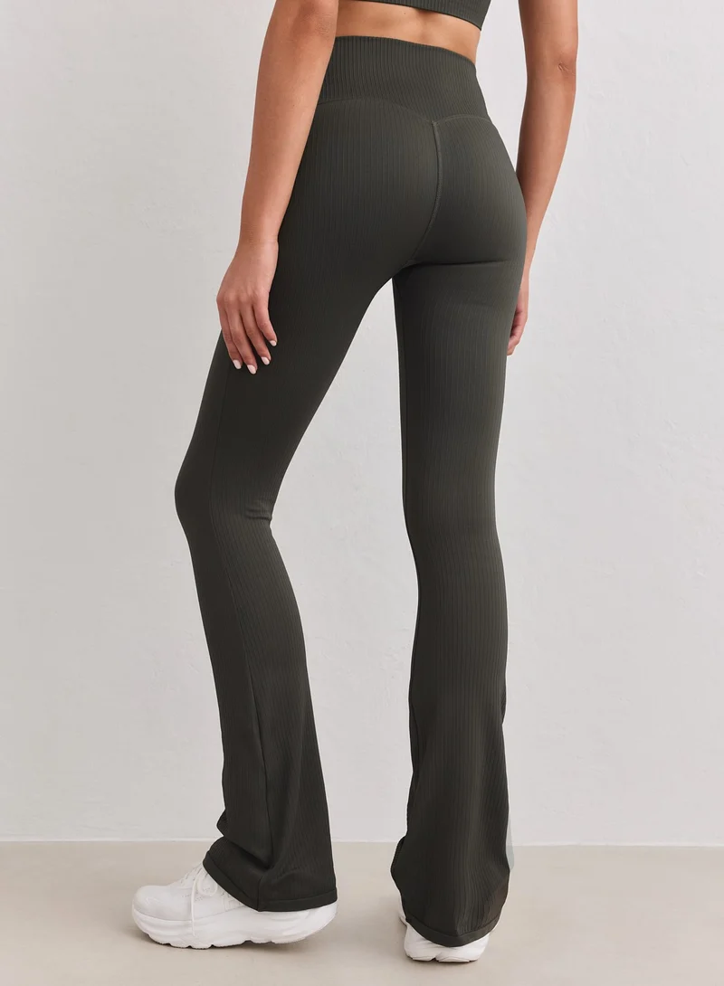 Dark Ivy Ribbed Seamless Flare Tights