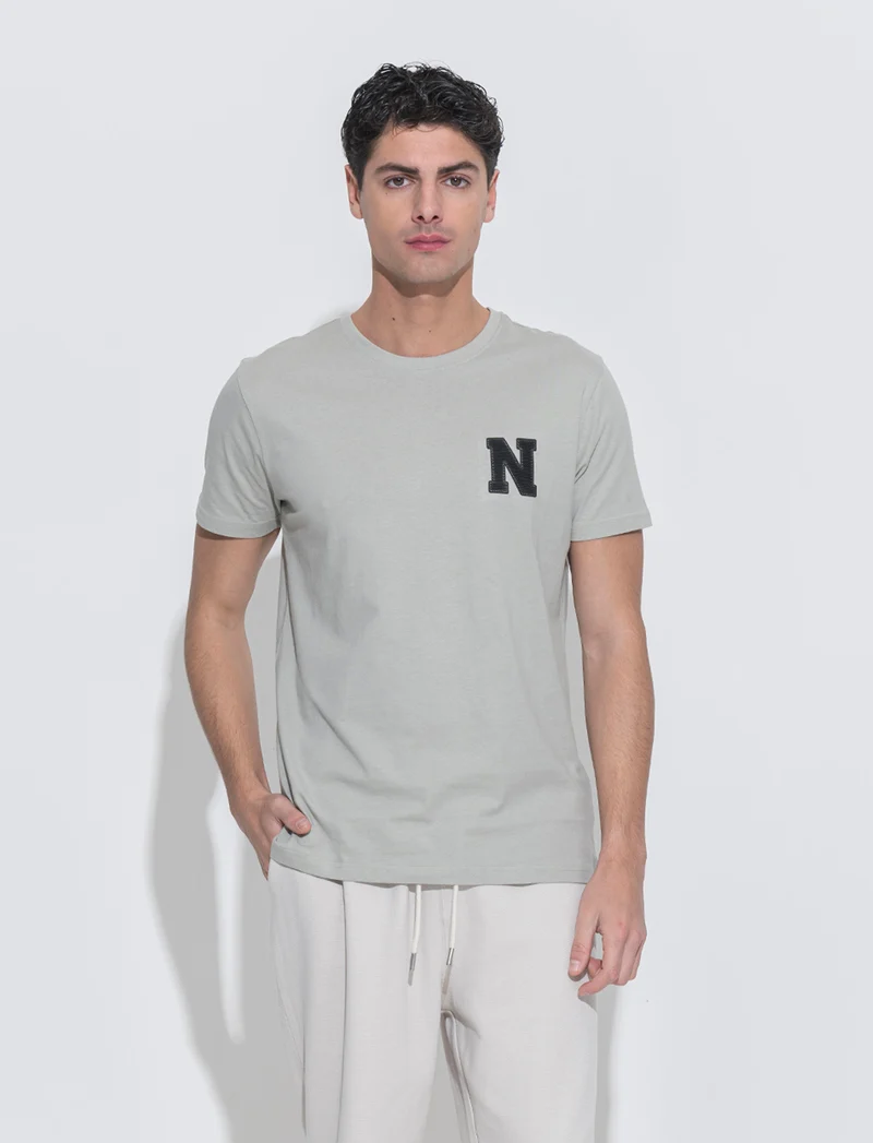 T-shirt in cotone con stampa da uomo - Verde