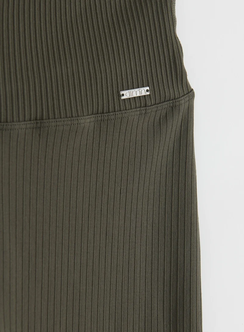 Dark Ivy Ribbed Seamless Flare Tights