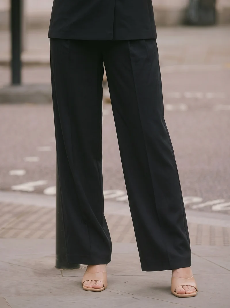 Pantalone a vita alta con elastico largo - Nero
