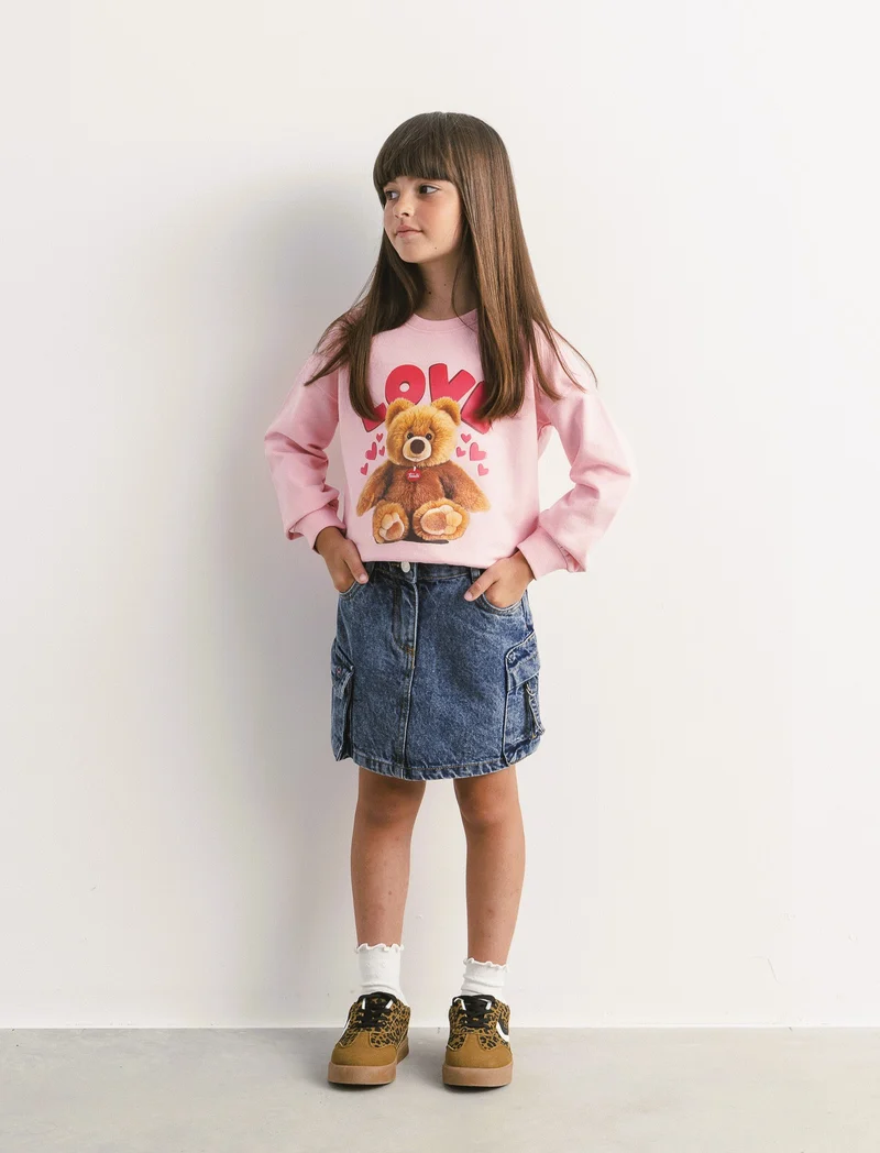 Gonna da bambina in denim con tasconi laterali. - Denim