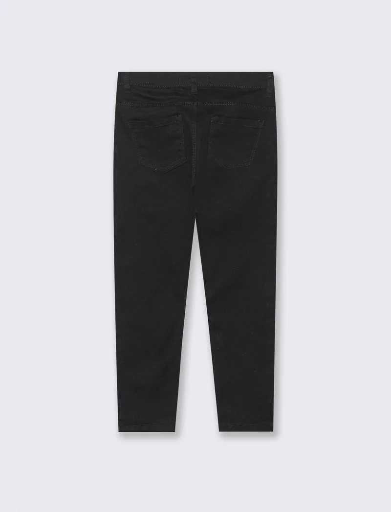 Pantalone skinny da bambina. - Nero