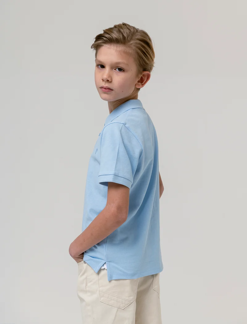 Polo mezza manica da bambino - Turchese
